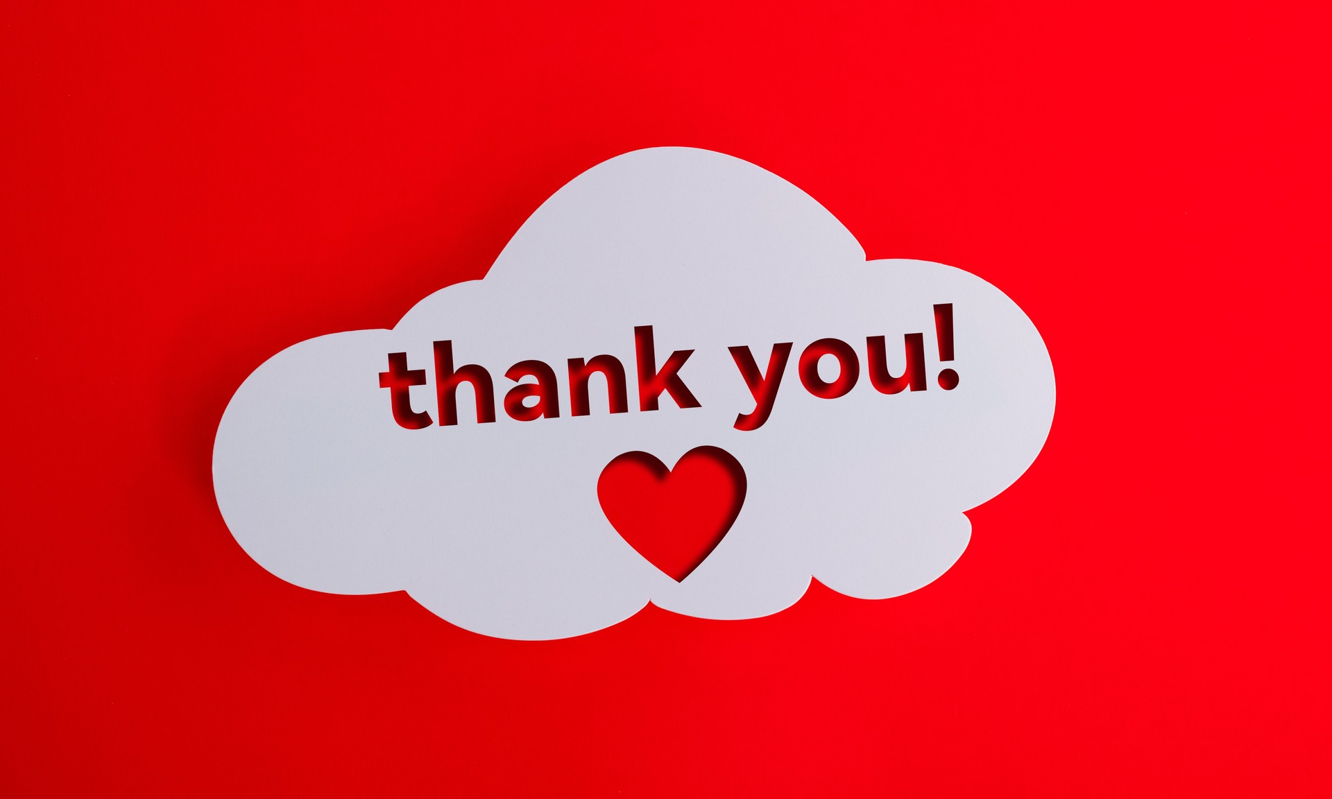 Speech bubble with thank you and heart shape