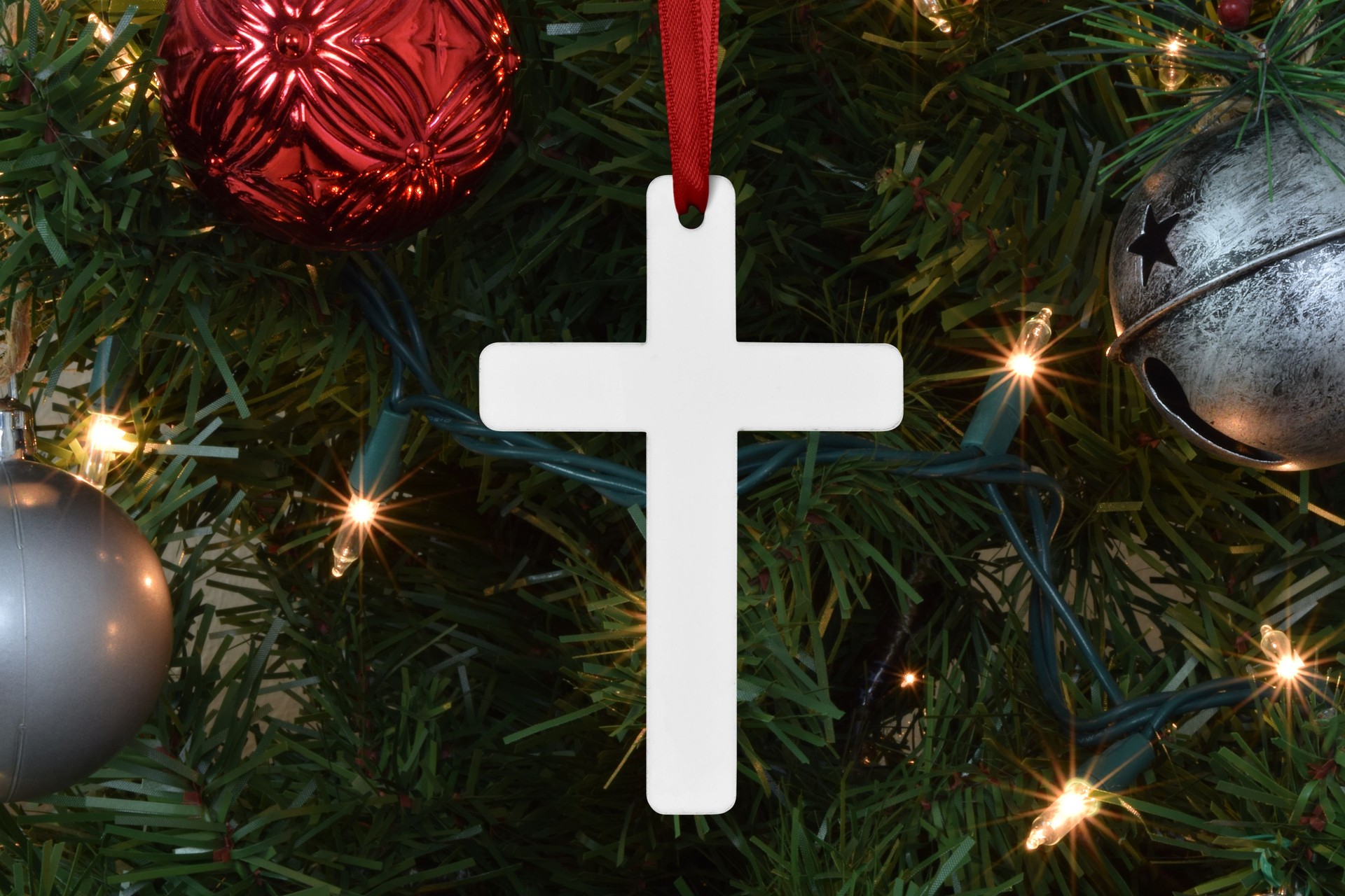 Cross Ornament Mockup Styled on Lit-Up Christmas Tree
