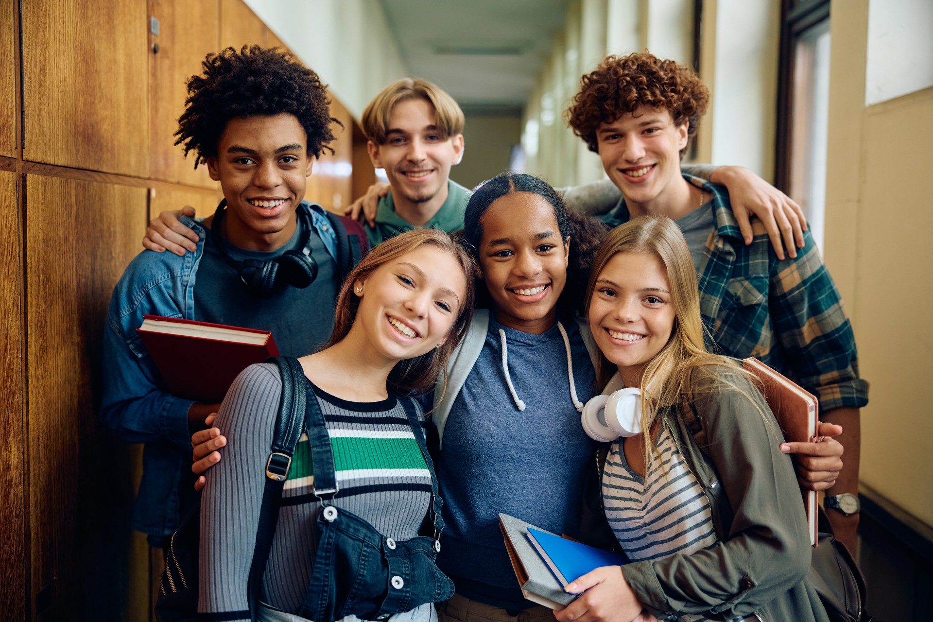 Portrait of happy high school students looking at camera.